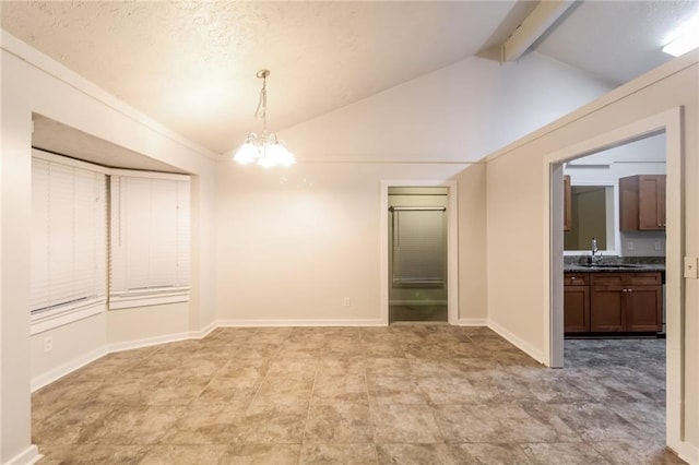 unfurnished room with sink, lofted ceiling with beams, and an inviting chandelier