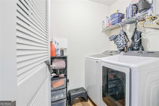 5 Corbel Way, Newnan, GA 30265 - laundry room with washing machine and dryer and wood finished floors