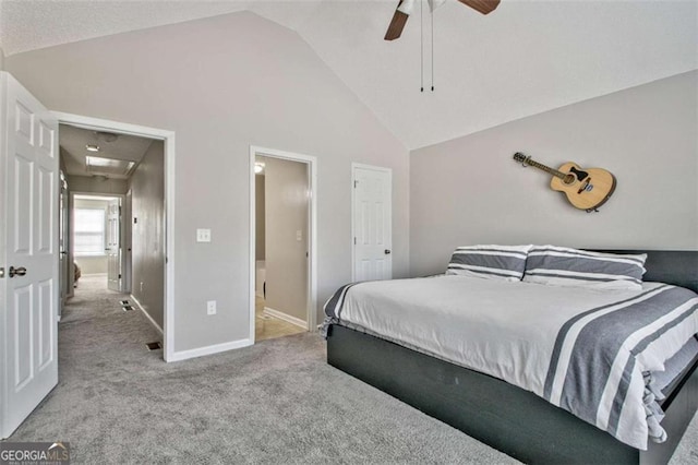 5 Corbel Way, Newnan, GA 30265 - carpeted bedroom with baseboards, ceiling fan, ensuite bath, and high vaulted ceiling