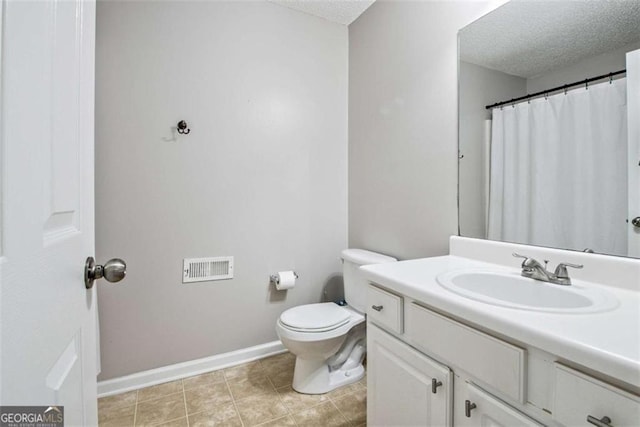 5 Corbel Way, Newnan, GA 30265 - bathroom featuring a textured ceiling, vanity, toilet, baseboards, and curtained shower