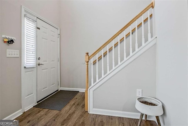 5 Corbel Way, Newnan, GA 30265 - entryway featuring wood finished floors, stairs, and baseboards
