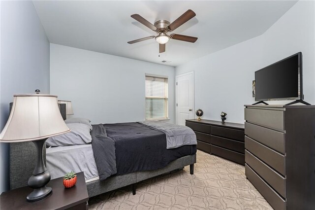 bedroom featuring ceiling fan