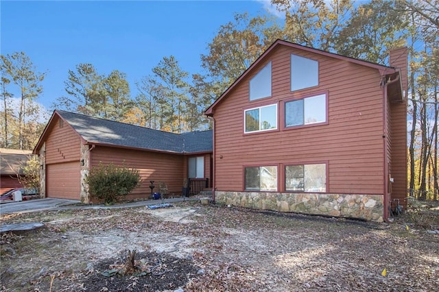 view of home's exterior featuring a garage