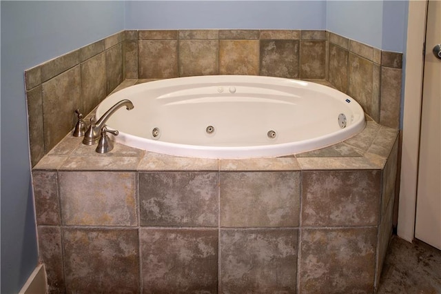 full bath featuring a whirlpool tub