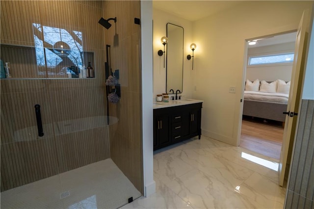 1122 Rice St NW, Atlanta, GA 30318 - bathroom featuring connected bathroom, vanity, a shower stall, marble look tiles, and baseboards