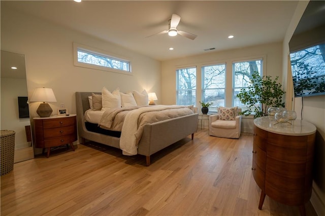 1122 Rice St NW, Atlanta, GA 30318 - bedroom with light wood-type flooring, multiple windows, recessed lighting, and a ceiling fan