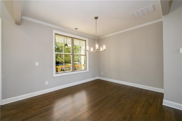 unfurnished room with an inviting chandelier, crown molding, and dark hardwood / wood-style floors