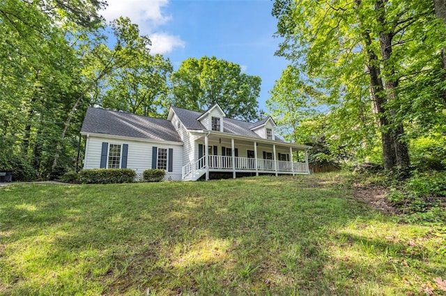 exterior space with covered porch and a lawn