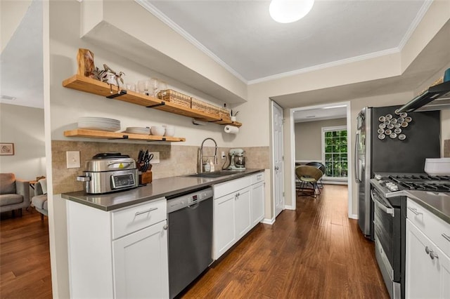 kitchen with dark wood-style flooring, dark countertops, open shelves, a sink, and stainless steel appliances