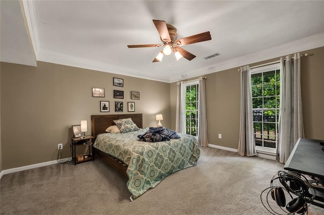 carpeted bedroom with crown molding, baseboards, visible vents, and access to exterior