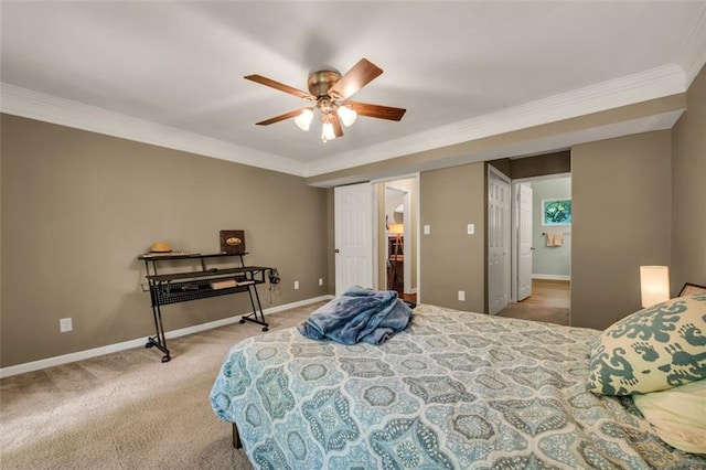 bedroom featuring crown molding, a ceiling fan, carpet, and baseboards