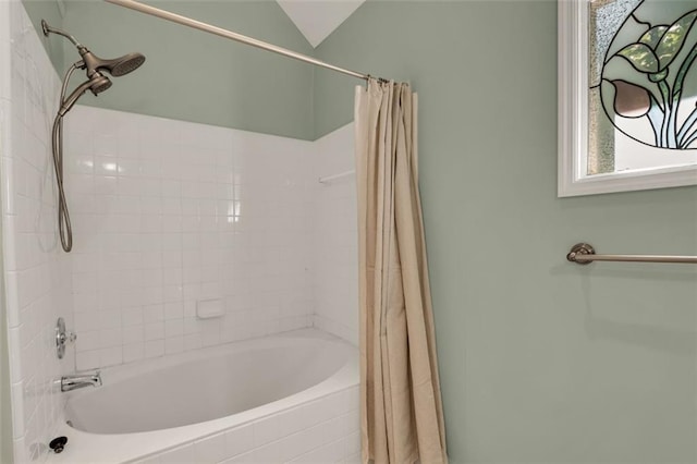 full bathroom featuring shower / tub combo with curtain