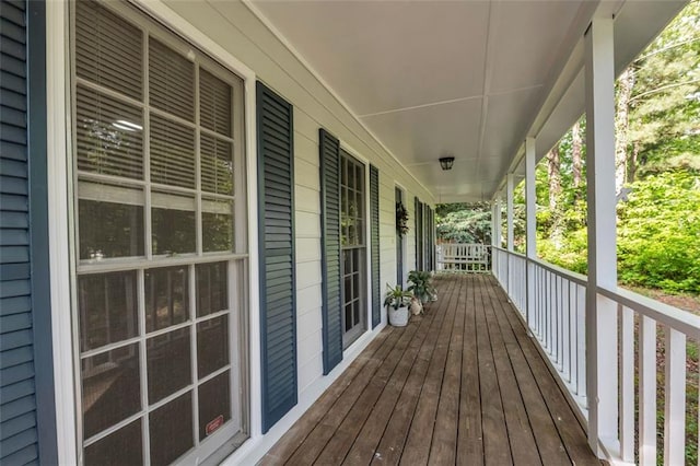 wooden terrace featuring a porch