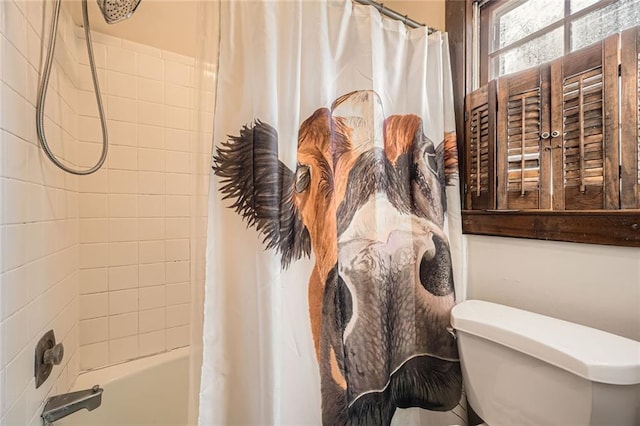 full bath featuring shower / bathtub combination with curtain and toilet