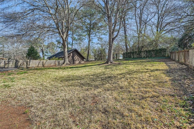 view of yard featuring a fenced backyard