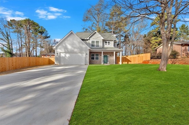 view of front facade featuring a garage and a front lawn