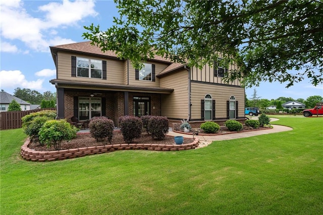 view of front of house featuring brick siding and board and batten siding