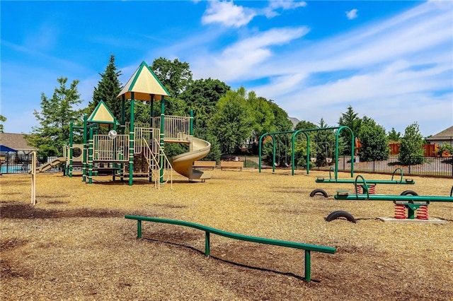 community play area featuring fence