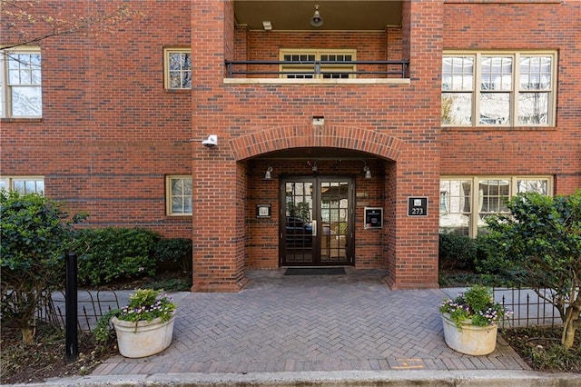 doorway to property featuring french doors and a balcony