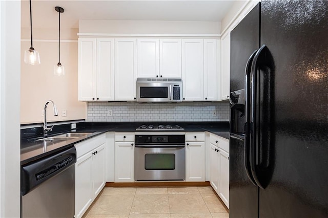 kitchen with white cabinetry, sink, and appliances with stainless steel finishes