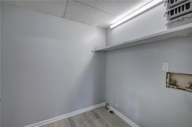 128 Evergreen Trl Unit 4, Cartersville, GA 30121 - laundry area featuring hookup for a washing machine, wood finished floors, hookup for a gas dryer, and baseboards