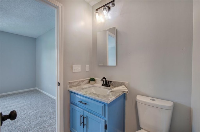 128 Evergreen Trl Unit 4, Cartersville, GA 30121 - bathroom with vanity, toilet, a textured ceiling, and baseboards