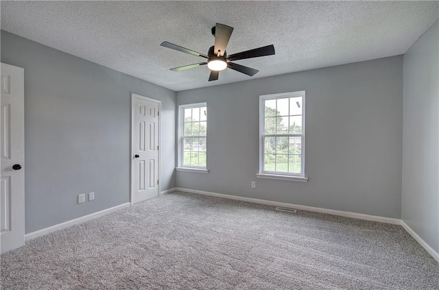 128 Evergreen Trl Unit 4, Cartersville, GA 30121 - unfurnished bedroom featuring carpet, baseboards, a textured ceiling, a ceiling fan, and a closet