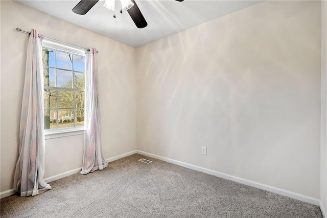 empty room with carpet floors and ceiling fan