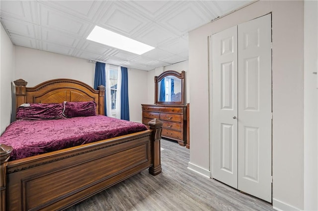 bedroom with light hardwood / wood-style flooring