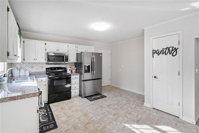 kitchen featuring tasteful backsplash, white cabinetry, sink, ornamental molding, and stainless steel appliances