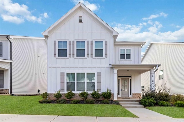 view of front of home with a front lawn