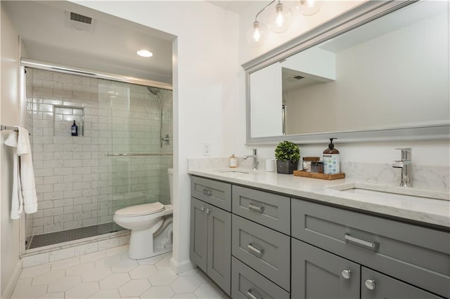 39 Ivy Gates NE, Atlanta, GA 30342 - bathroom with a sink, toilet, double vanity, and a stall shower
