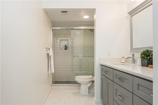 39 Ivy Gates NE, Atlanta, GA 30342 - full bathroom with a shower stall, vanity, visible vents, and toilet
