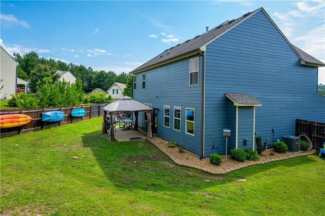 200 Lower Dove Ct, Ball Ground, GA 30107 - rear view of house with a gazebo, a fenced backyard, and a patio