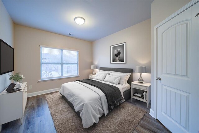 spare room featuring dark hardwood / wood-style floors