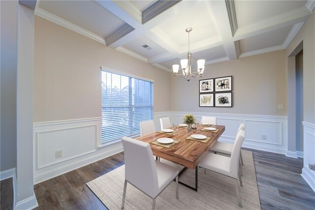 spare room featuring beamed ceiling, a chandelier, crown molding, and coffered ceiling