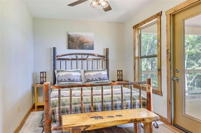 bedroom with light wood-style floors and baseboards