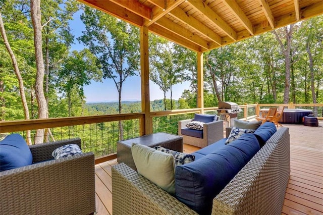 deck featuring grilling area and an outdoor living space