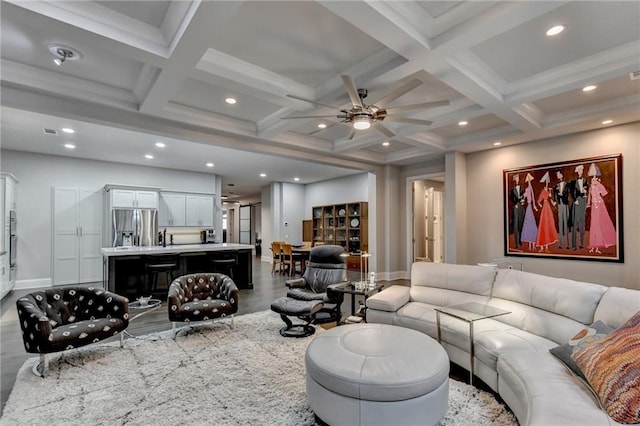 living room featuring wood finished floors, beam ceiling, coffered ceiling, and recessed lighting