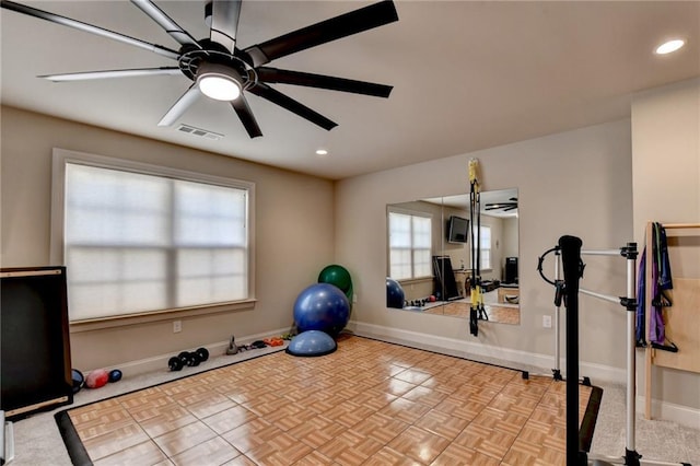 exercise area featuring ceiling fan, visible vents, baseboards, and recessed lighting