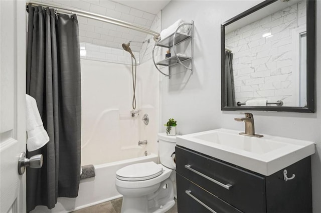 full bath with vanity, toilet, and shower / bath combo with shower curtain