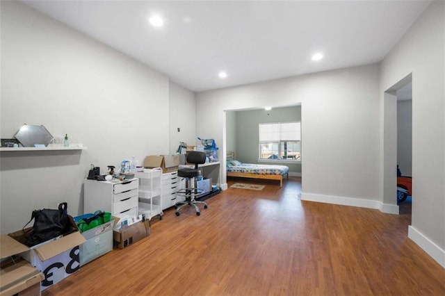 office with wood-type flooring