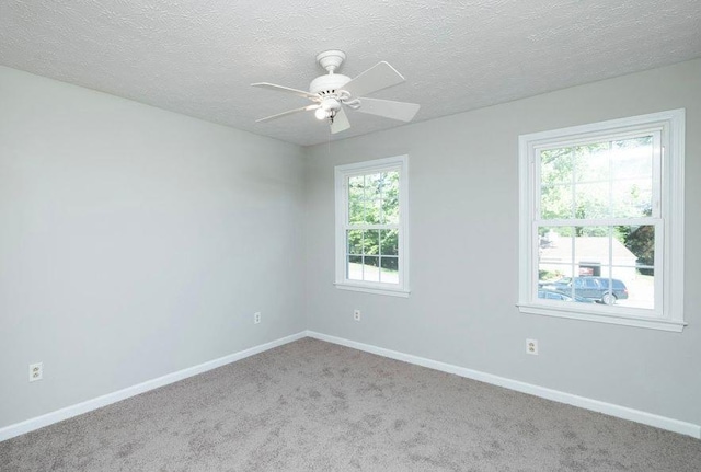 1391 Warrenton Hunt, Lawrenceville, GA 30043 - unfurnished room featuring ceiling fan, carpet flooring, and a textured ceiling