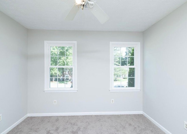 1391 Warrenton Hunt, Lawrenceville, GA 30043 - empty room with carpet floors, a ceiling fan, and a textured ceiling