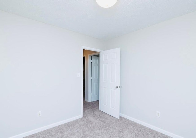 1391 Warrenton Hunt, Lawrenceville, GA 30043 - unfurnished room featuring light carpet and baseboards