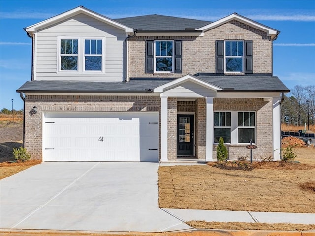 view of front of home with a garage