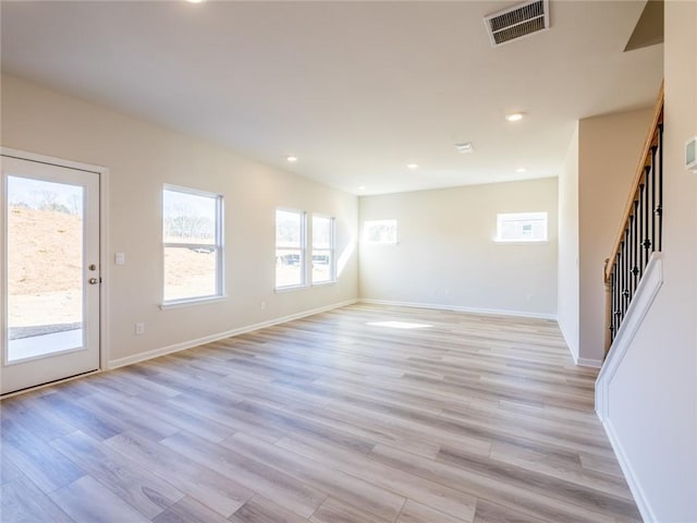 empty room with light wood-type flooring