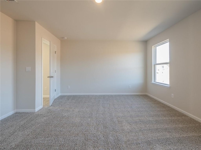 empty room featuring carpet