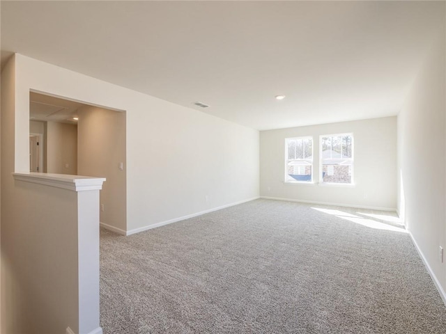 unfurnished room with carpet flooring