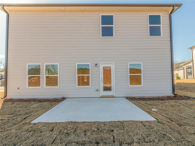 back of property with a patio area